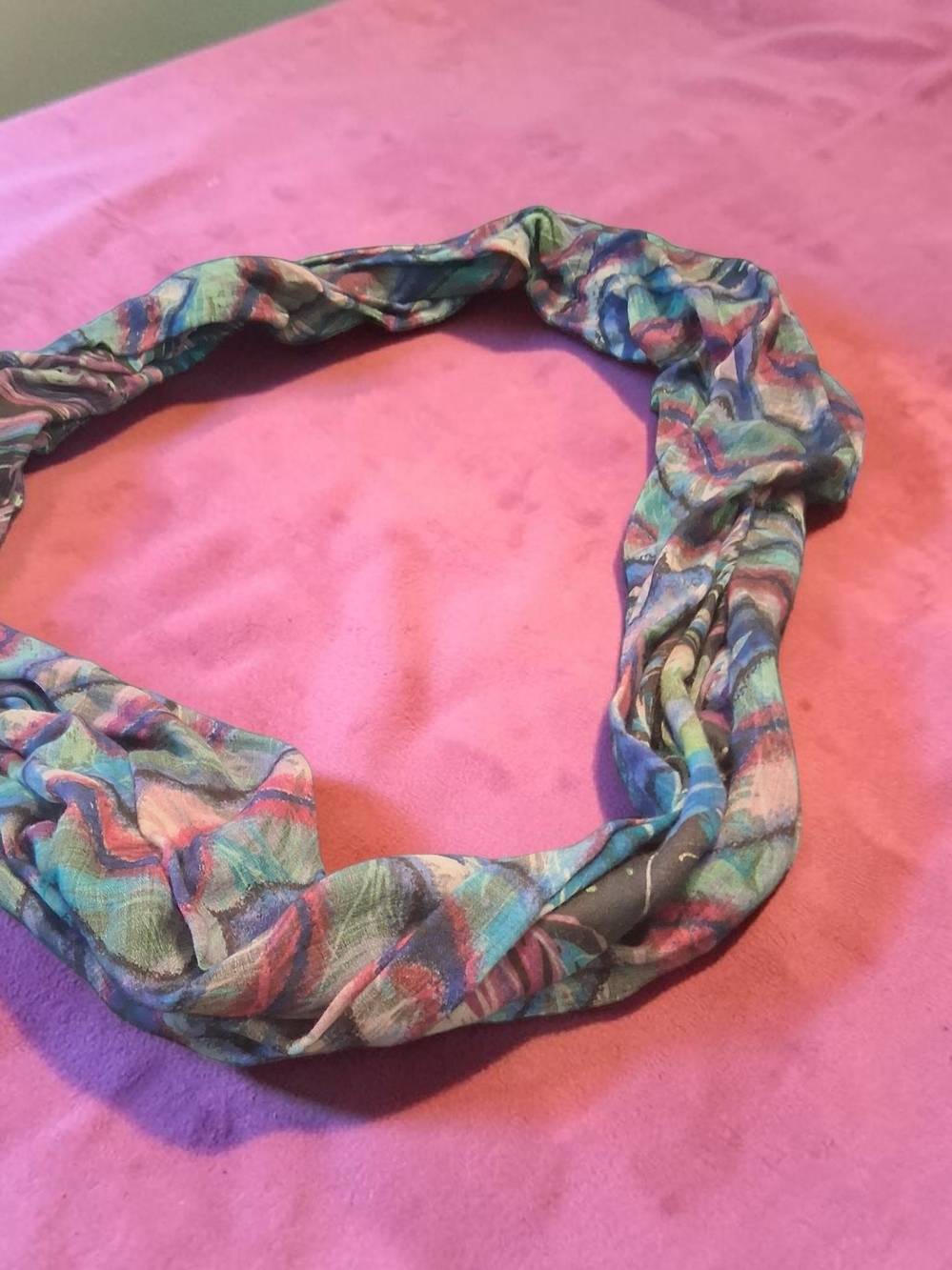 loop scarf features a vibrant, colorful gradient Abstract pattern